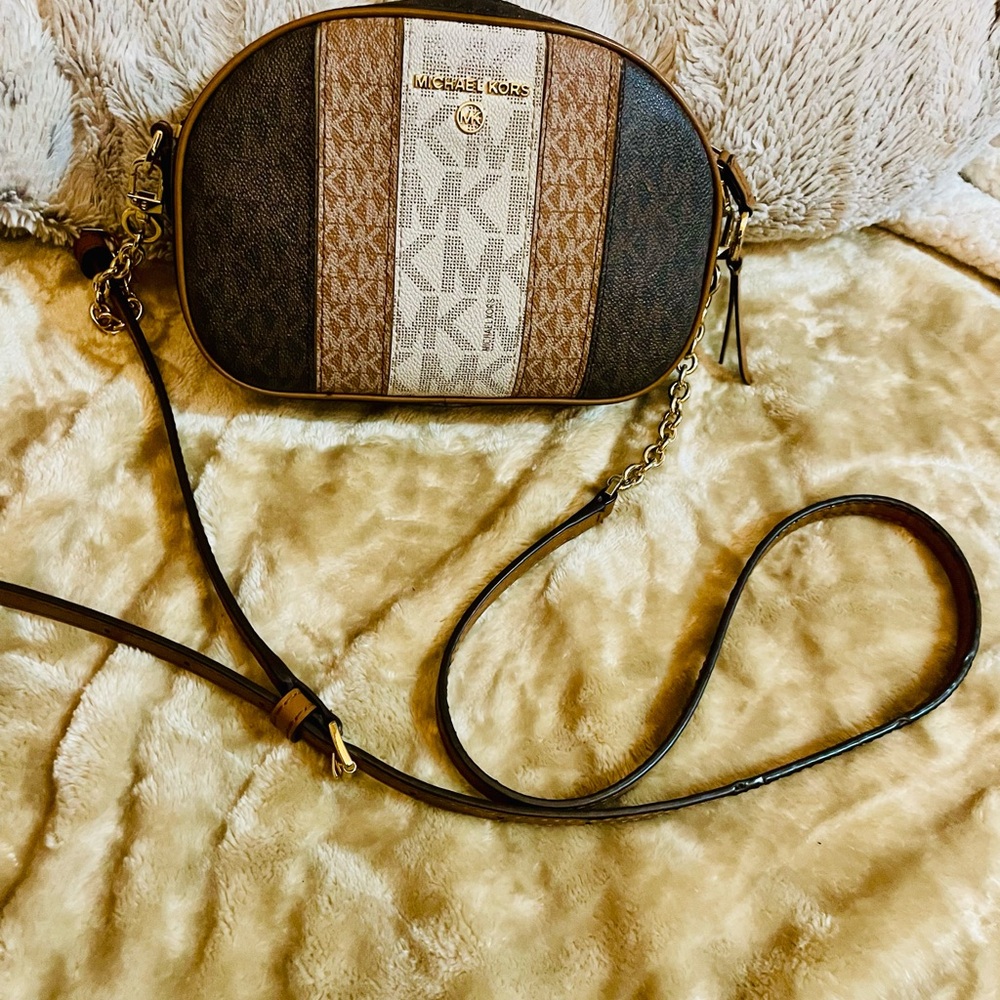 Michael Kors brown MK signat  crossbody purse and matching wallet.